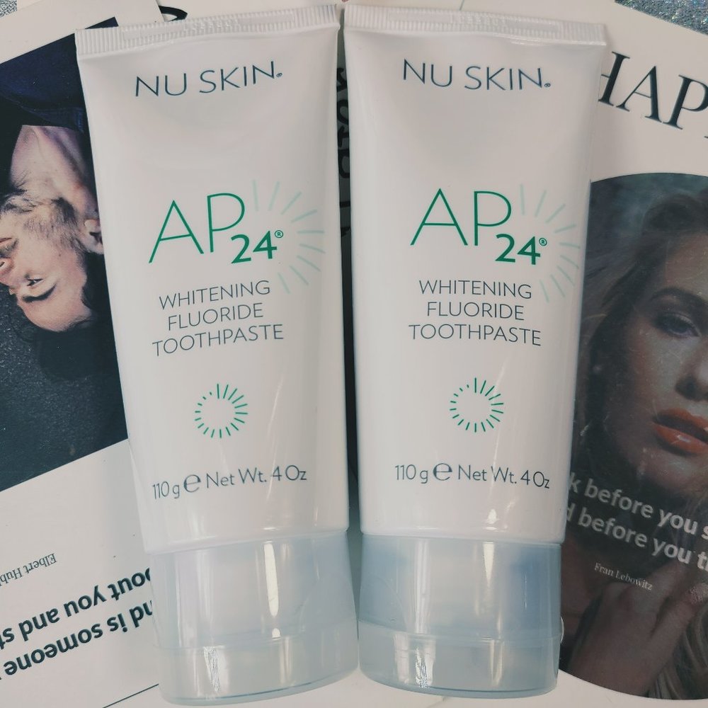 2 tubes of Nuskin Whitening Fluoride Toothpaste AP24 110g + 1 towel